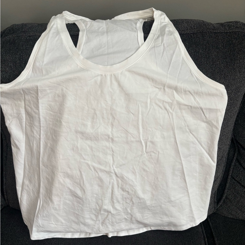 Lululemon white work out tank.  Only worn once.  Size 14.